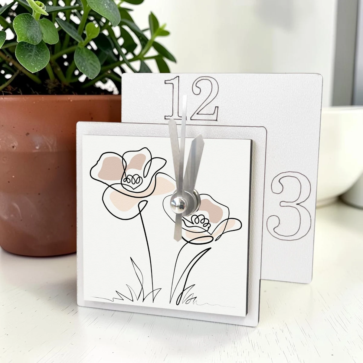 Orologio bomboniera fiori ambientato per matrimonio e comunione Albalu